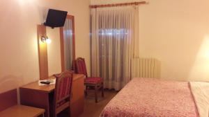 Postel nebo postele na pokoji v ubytování Hotel Edelweiss