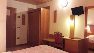 Postel nebo postele na pokoji v ubytování Hotel Edelweiss