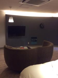 Телевизор и/или развлекательный центр в Hotel Glow Yokkaichi (Adult Only)