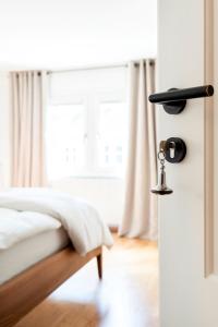 Postel nebo postele na pokoji v ubytování Hotel Zum Verwalter Dornbirn