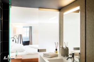 Postel nebo postele na pokoji v ubytování Hotel Zum Verwalter Dornbirn