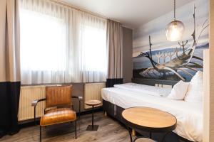 Postel nebo postele na pokoji v ubytování Best Western Hotel Nürnberg am Hauptbahnhof