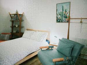 Postel nebo postele na pokoji v ubytování XiaoBei Home2