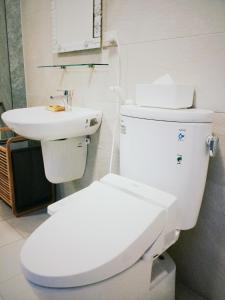 Koupelna v ubytování XiaoBei Home2