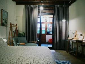 Postel nebo postele na pokoji v ubytování XiaoBei Home2