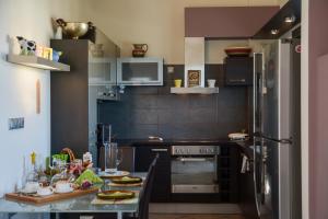 A kitchen or kitchenette at Serenity Villa-1st floor-Sea view- sea 150m away