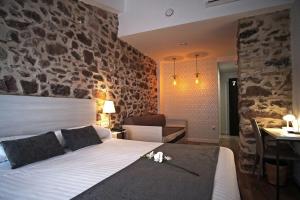Postel nebo postele na pokoji v ubytování Soléa House Hotel Boutique