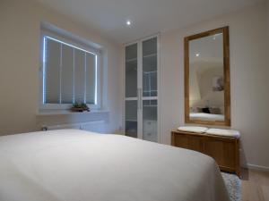 Postel nebo postele na pokoji v ubytování Appartement Lehnsweg 8, Büsum