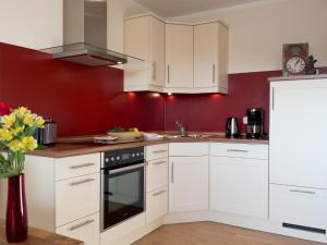 Kuchyň nebo kuchyňský kout v ubytování Appartement Lehnsweg 8, Büsum