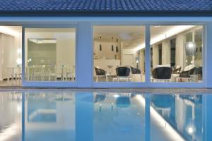 Bazén v ubytování Paestum Inn Beach Resort nebo v jeho okolí