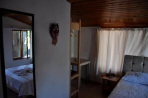 Postel nebo postele na pokoji v ubytování KUŞ YUVASI PANSiYON