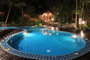 Piscina de la sau aproape de Marisa Resort & Spa Chiang Dao