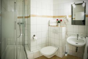 Kylpyhuone majoituspaikassa Hotel Famosa