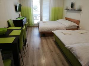Postel nebo postele na pokoji v ubytování Apartmán Diamond