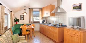 Kuchyň nebo kuchyňský kout v ubytování Apartment Gertrud