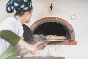 Hostia v ubytovaní Vegan Hotel La Vimea