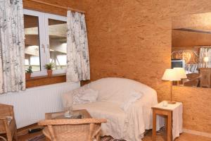 Ruang duduk di kleines Appartment auf Gestütsanlage