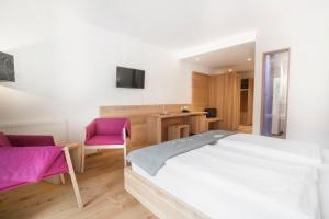 Posteľ alebo postele v izbe v ubytovaní Vegan Hotel La Vimea