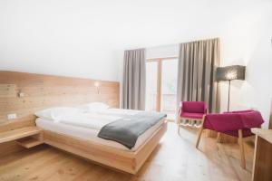 Posteľ alebo postele v izbe v ubytovaní Vegan Hotel La Vimea