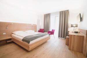 Posteľ alebo postele v izbe v ubytovaní Vegan Hotel La Vimea