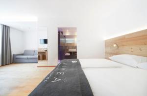 Posteľ alebo postele v izbe v ubytovaní Vegan Hotel La Vimea