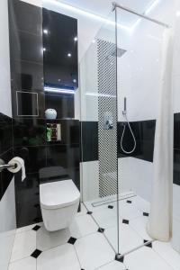 ห้องน้ำของ Rental Apartments Krochmalna