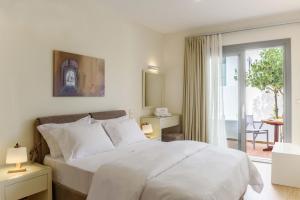 Кровать или кровати в номере Melia Sol Art Studios