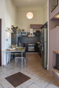A kitchen or kitchenette at Serenity Villa-1st floor-Sea view- sea 150m away