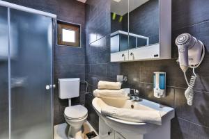 Koupelna v ubytování Apartments Sidro