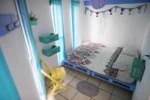 Postel nebo postele na pokoji v ubytování Hostal La Isla