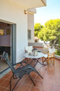 A balcony or terrace at Serenity Villa-1st floor-Sea view- sea 150m away