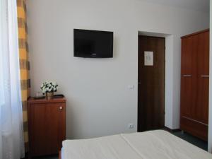 TV a/nebo společenská místnost v ubytování Livonija + 34 fotografií