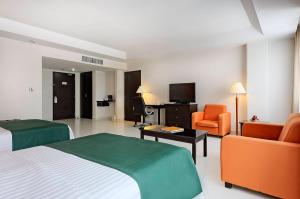 TV a/nebo společenská místnost v ubytování Holiday Inn Campeche by IHG
