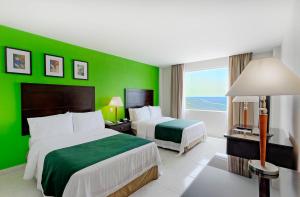 Postel nebo postele na pokoji v ubytování Holiday Inn Campeche by IHG