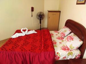 Postel nebo postele na pokoji v ubytování Hotel Mandarin