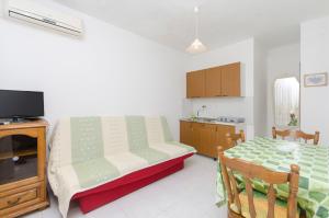 TV a/nebo společenská místnost v ubytování Apartment Niko