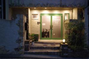 Fotografie z fotogalerie ubytování Cinnamon Guesthouse Dogo v destinaci Macujama
