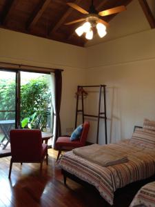Ein Bett oder Betten in einem Zimmer der Unterkunft Akachichi Guesthouse