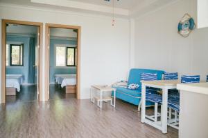 Voodi või voodid majutusasutuse Saipan Emerald Villa toas