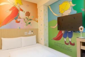 Katil atau katil-katil dalam bilik di Morwing Hotel - Culture Vogue