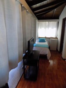 Postel nebo postele na pokoji v ubytování Hotel Concorde