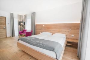 Posteľ alebo postele v izbe v ubytovaní Vegan Hotel La Vimea