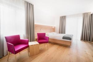 Posteľ alebo postele v izbe v ubytovaní Vegan Hotel La Vimea