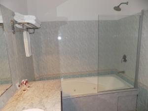 Koupelna v ubytování Hotel Concorde