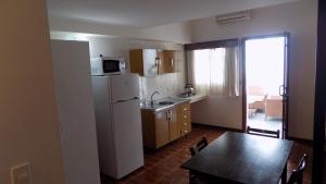 Kuchyň nebo kuchyňský kout v ubytování Hotel Concorde