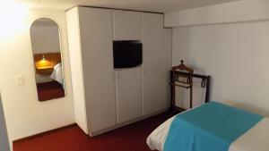 Postel nebo postele na pokoji v ubytování Hotel Concorde