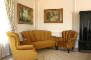 Posezení v ubytování Sir David Balaton Castle Apartmanok
