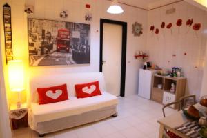 Postel nebo postele na pokoji v ubytování B&B Le Colombine