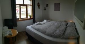 Letto o letti in una camera di Guesthouse Storu-Laugar