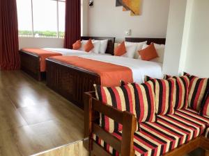 Postel nebo postele na pokoji v ubytování Avonil Resort Yala